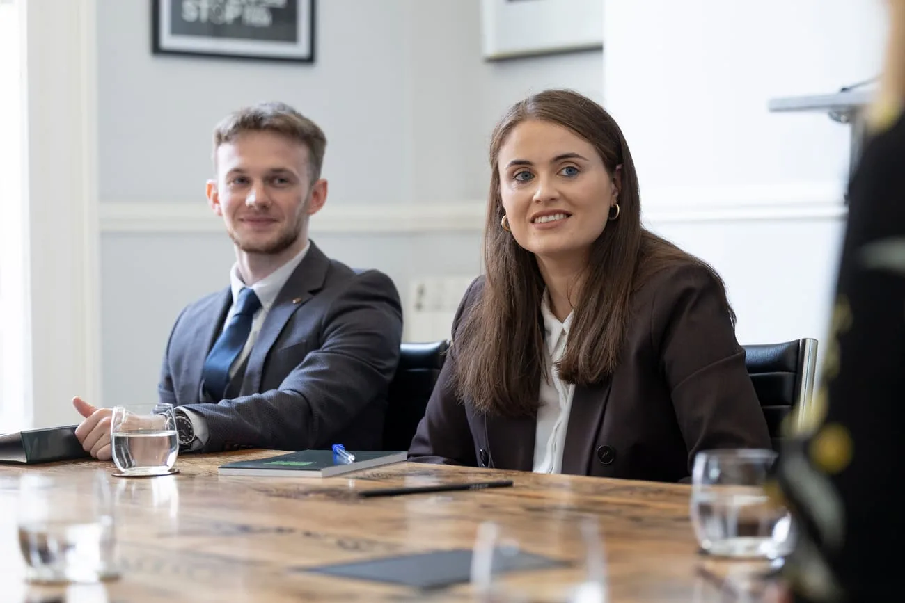 Solicitor at the conference table during a client consultation